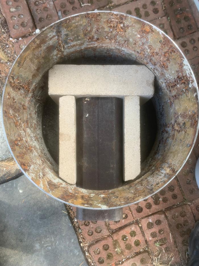 Setting firebricks to support tubes
