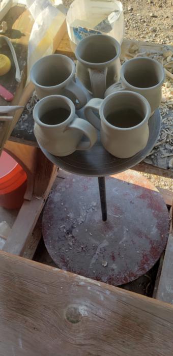 Pulled handles and trimmed mugs