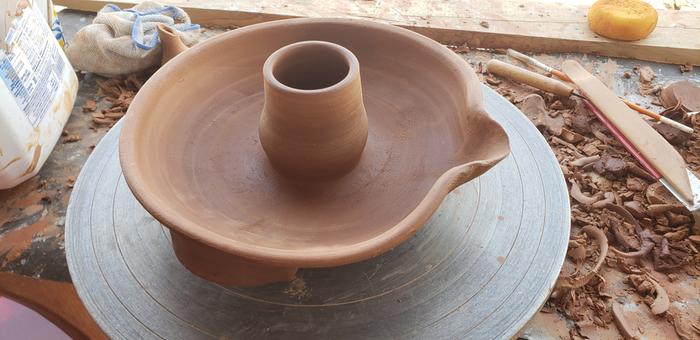 Rocket oven chicken roaster made from other half of wedged clay.