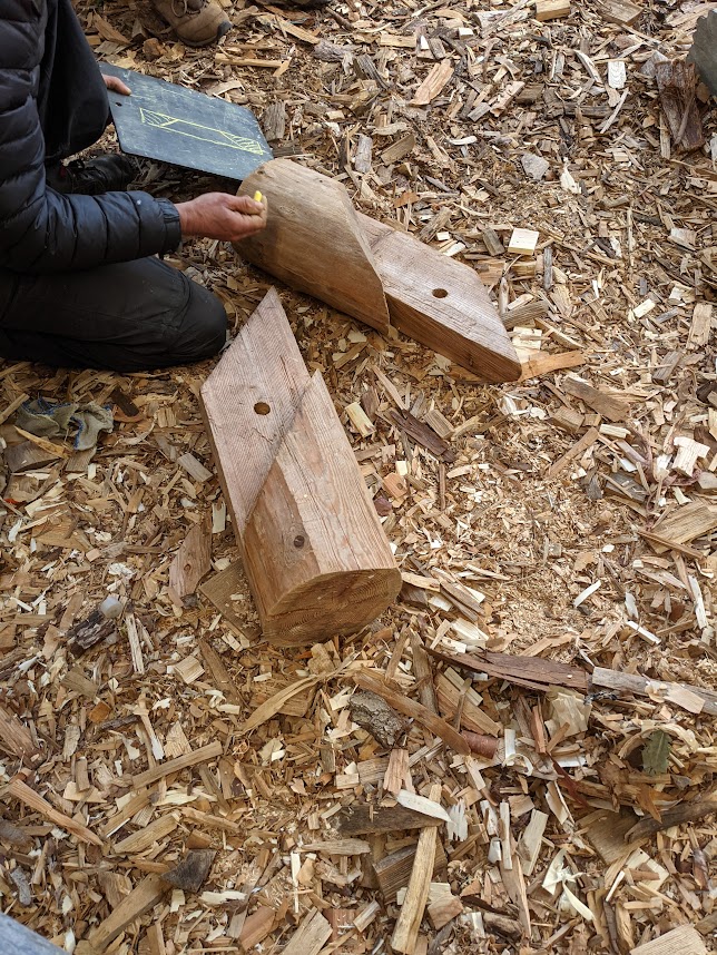 Ring beam logs are half-lapped at the appropriate angle