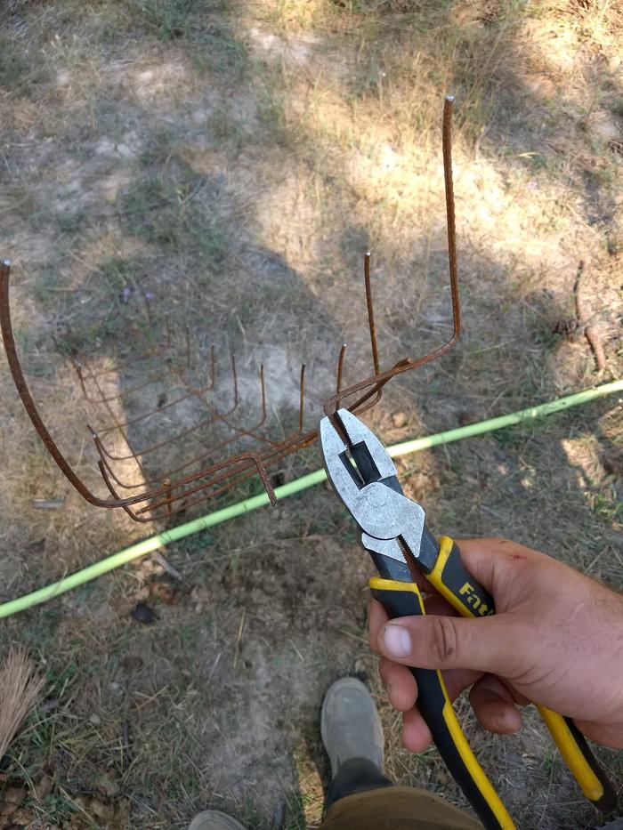 Bend the 'nails' a bit past 90deg (acute) so they don't flatten out while hammering in