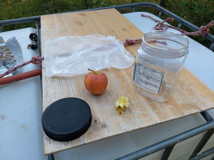 Raw materials: Container, bait, sticks (not shown)