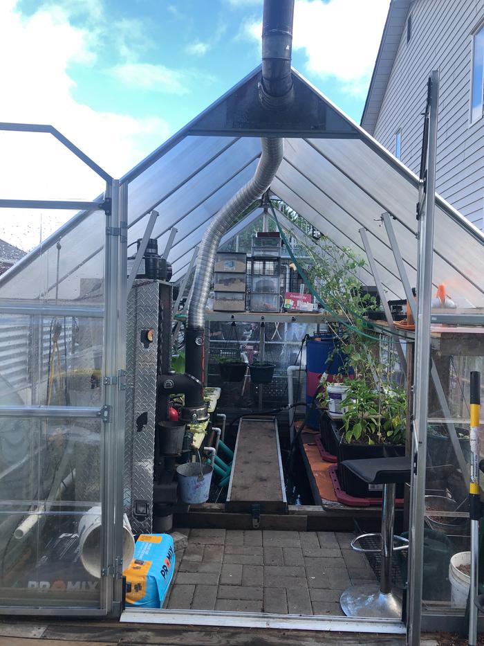 Aloha RMH installed in my greenhouse 