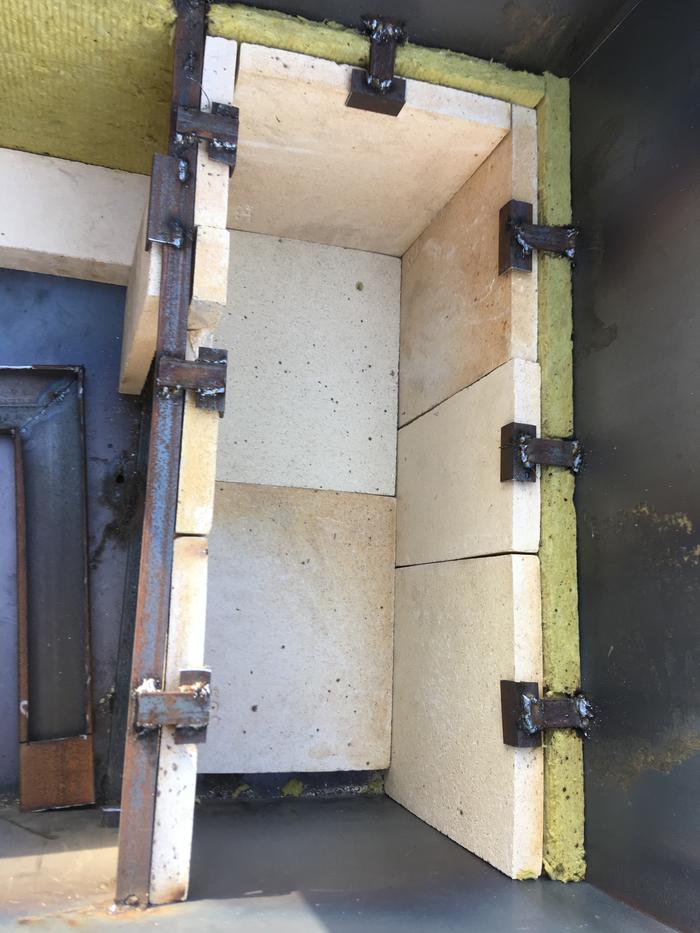 Bottom firebricks hold the side bricks in place, I should have insulated underneath, prototype :)