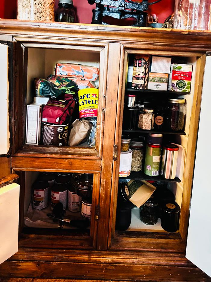 Vintage icebox repurposed as store cupboard