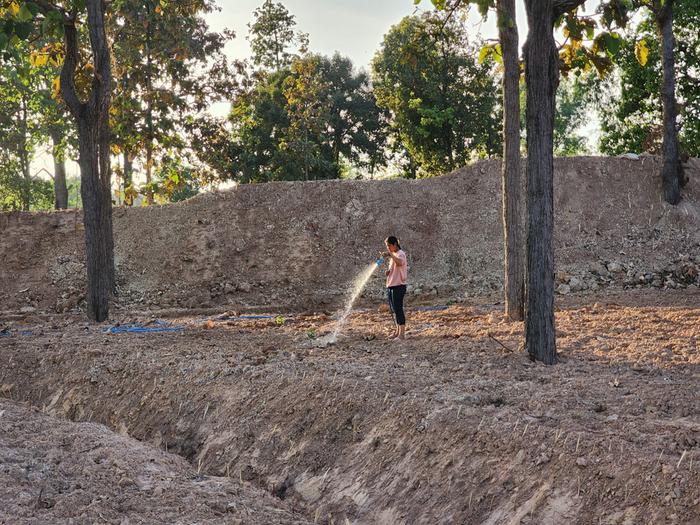 the well and our crew watered the soil and washed the distributed manure in