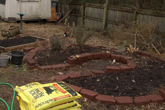 keyhole raised garden bed old bricks