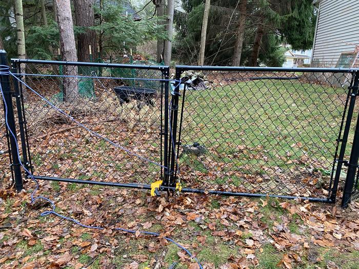 Rope and clamps to help hold in place to secure bottom corner. 