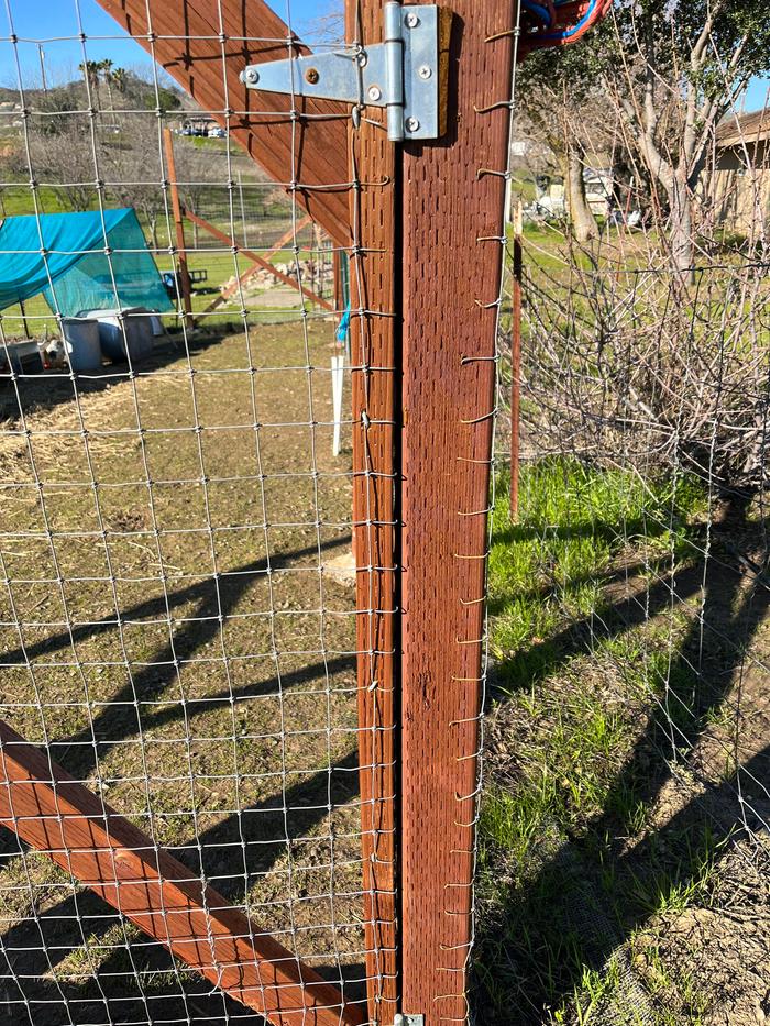 Hinge side to show that there's no much wiggle room to adjust the gate itself, and it still looks same as when it was installed.