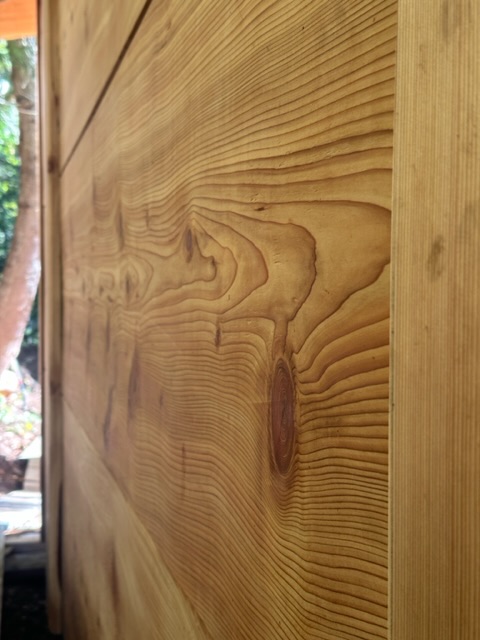 Massive wood slabs as siding