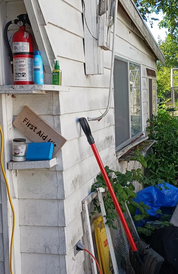 Fire extinguisher and boo boo kit.