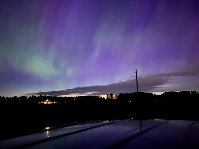 Aurora borealis and sunrise