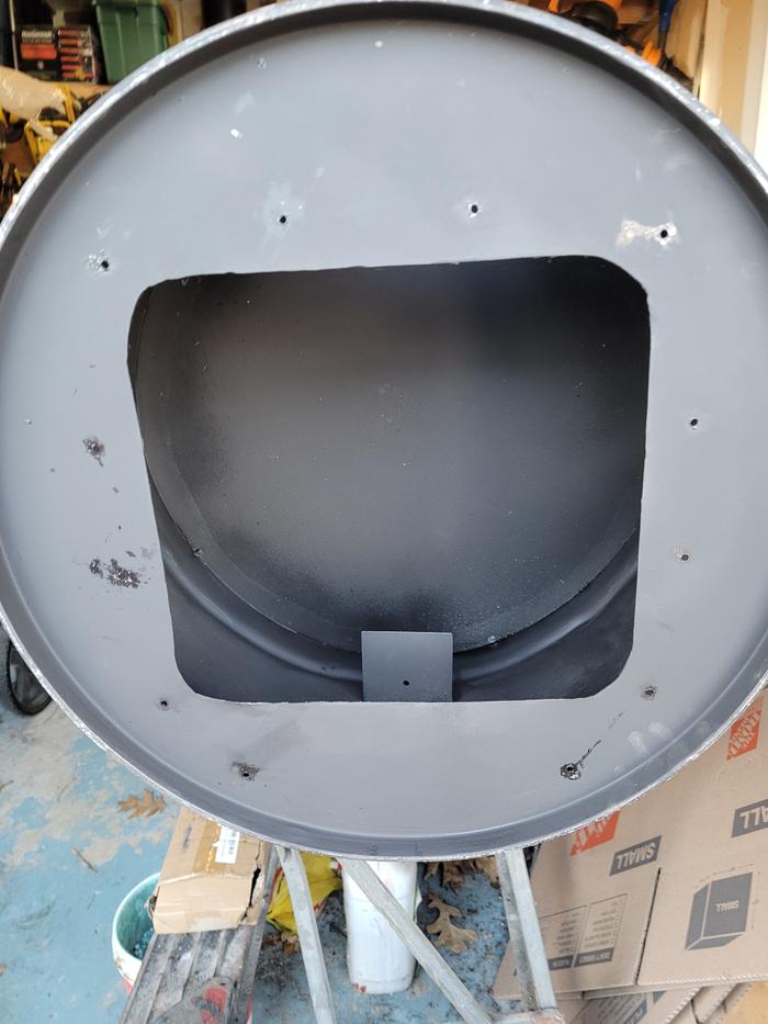 Sheet metal tab added to barrel to hold smoke stack