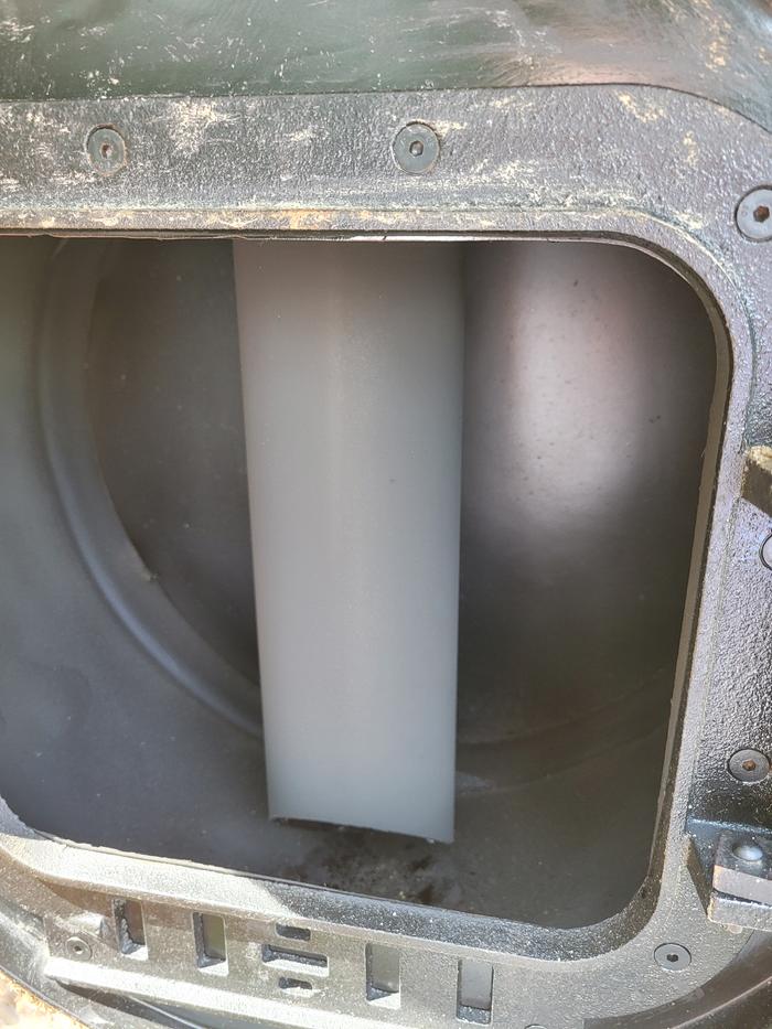 The rear of a rocket oven with the chimney installed
