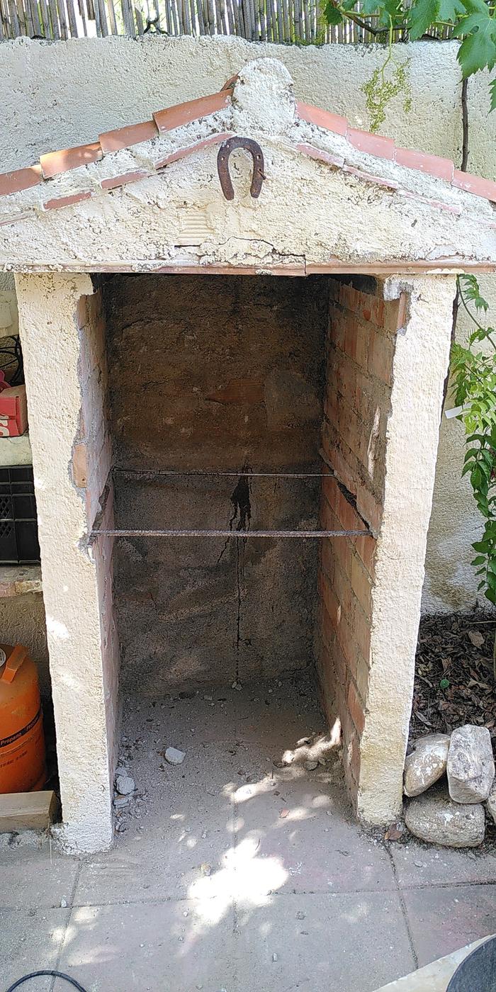 Broke off the old platform and was able to reuse some of the refractory brick for the riser