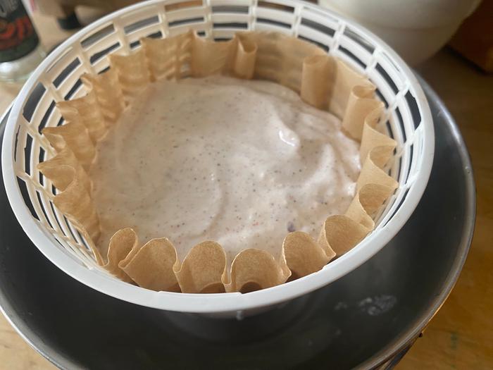 Once the curds were in the basket, I added another paper on top