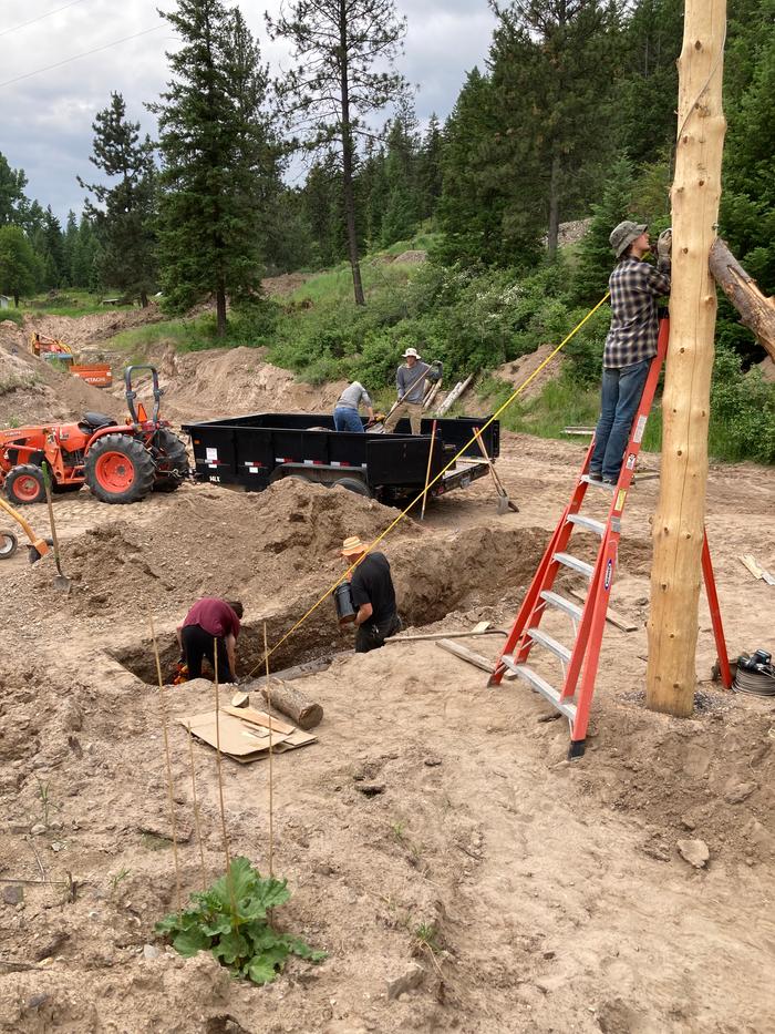 Measuring for cable length from anchor to pole