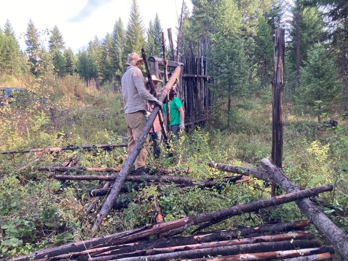 Junk pole fence rebuild after rainstorm