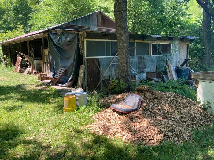 Chip pile next to side of barn