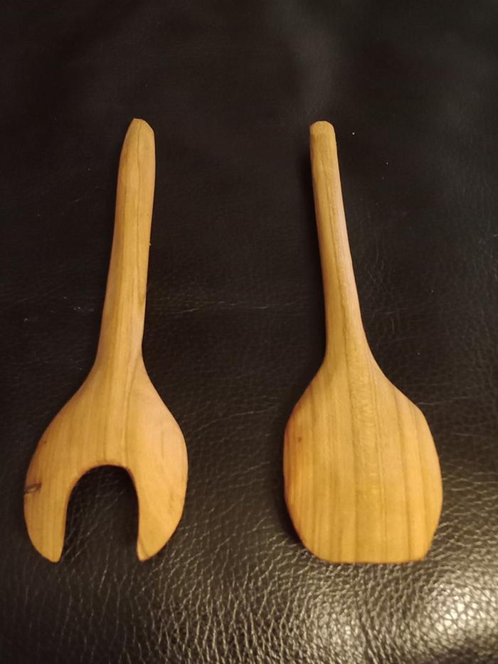 a set of wooden salad servers