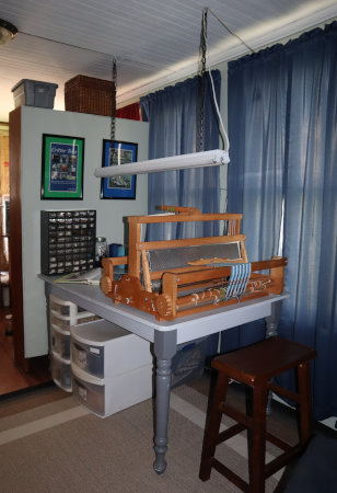 worktable (previously pictured with sewing machine) with my table loom