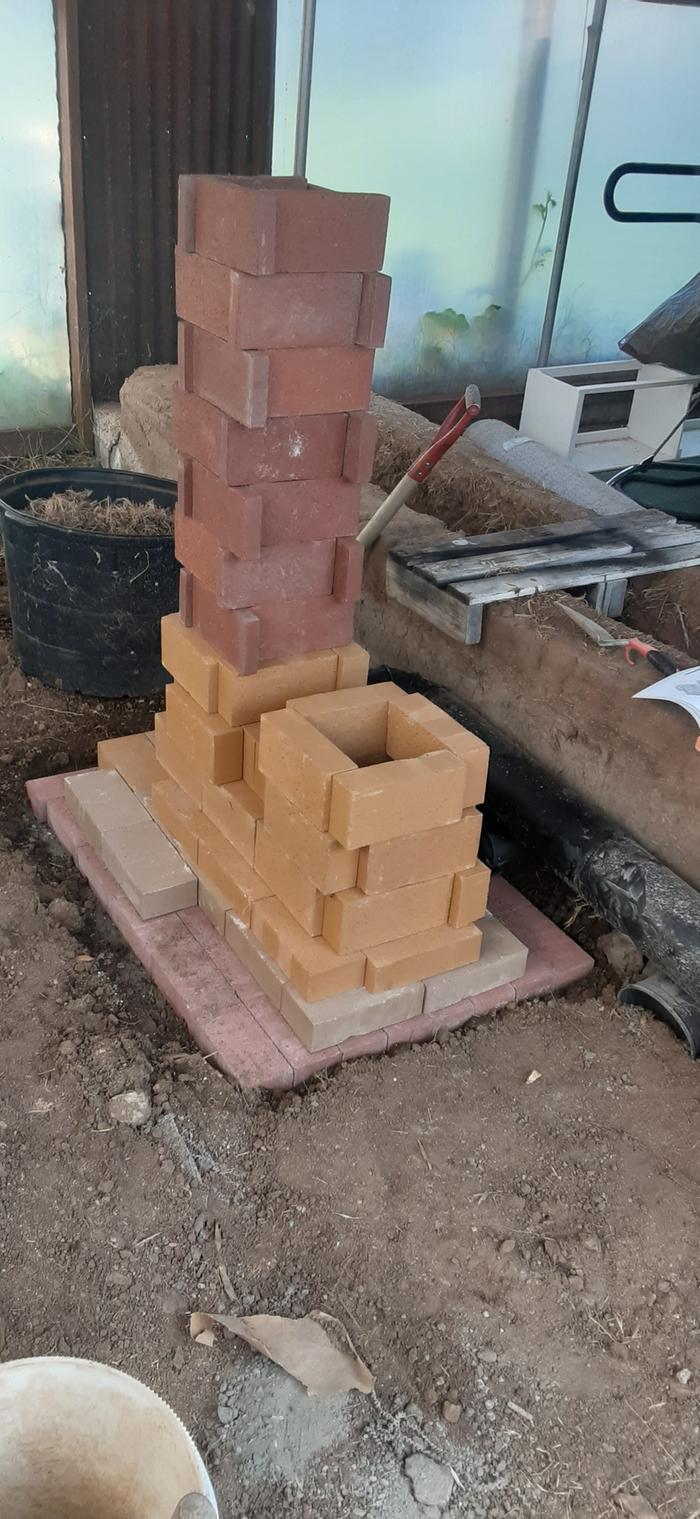 A firebrick rocket mass heater core