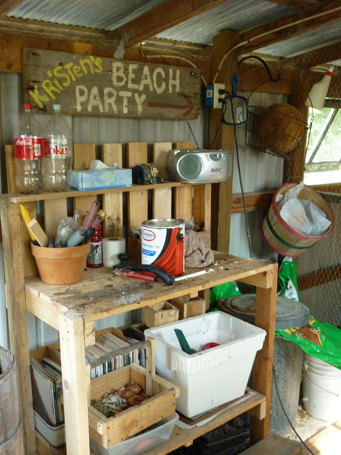 A sweet potting bench made from 2x4s and pallets