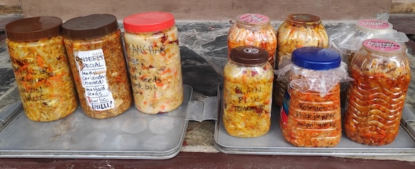 Ladakhi anchar with various spices in different jars