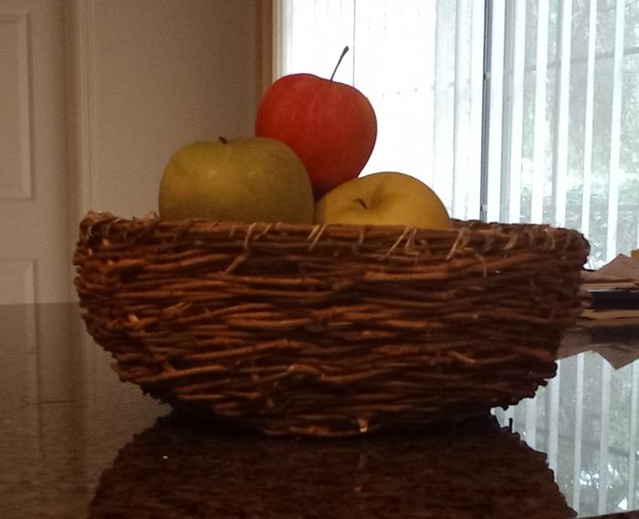 Basket with apples made out of English Ivy