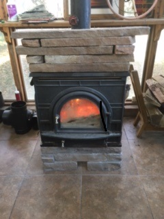 Wood stove on base