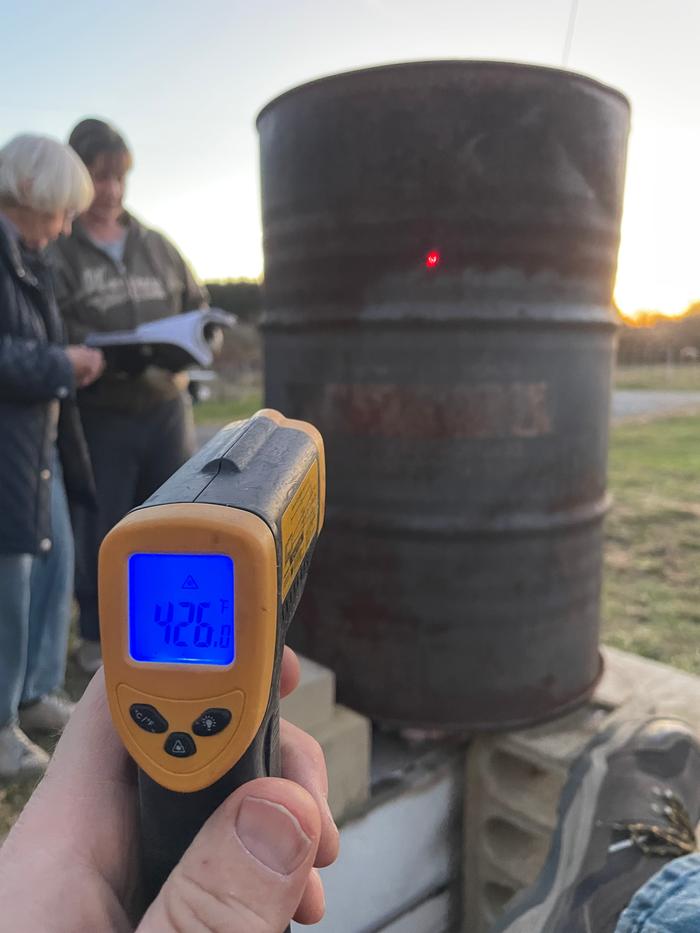 Barrel ona rocket mass heater getting up to temp