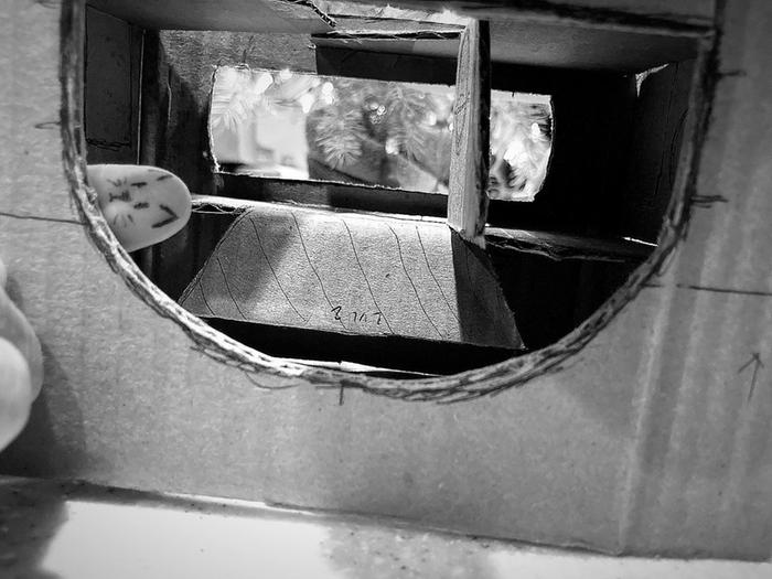cardboard model of a cat villa