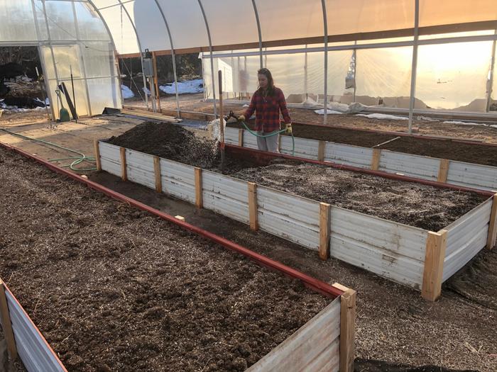 raised beds from used roofing metal in greenhouse