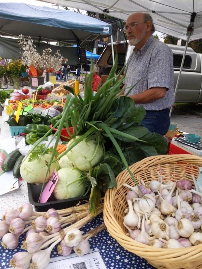 A table full of produce at a farmer's market