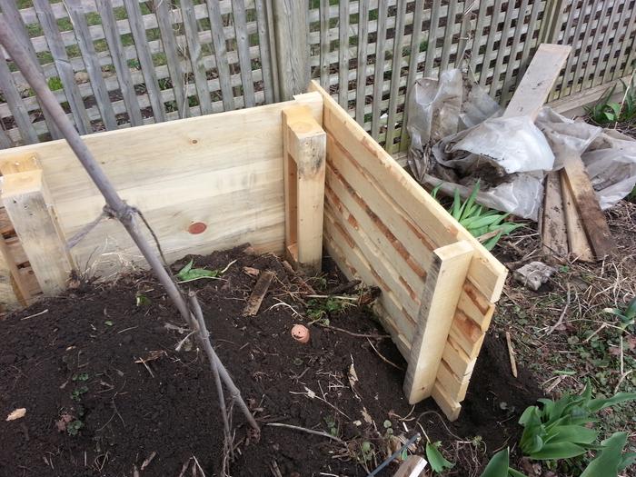 the south-facing pallets are gapped so as to allow for planting vines and alpine strawberries