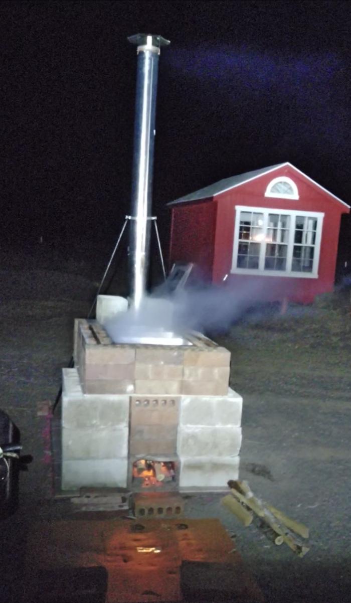 A rocket stove maple syrup evaporator