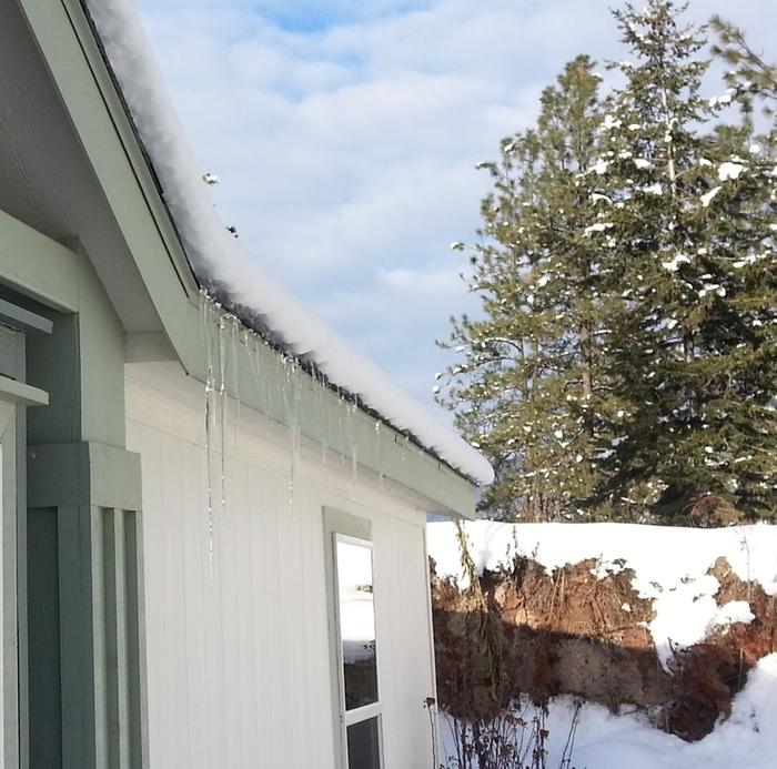 more icicles across the face of the Fisher Price house at base camp