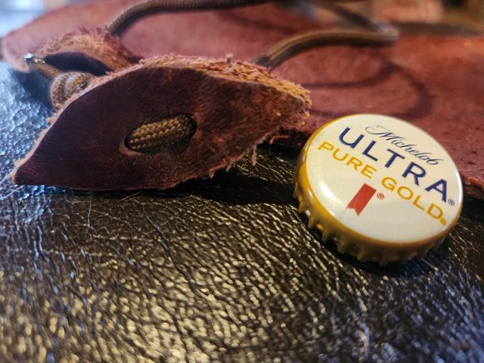 Closeup, beer cap for size reference