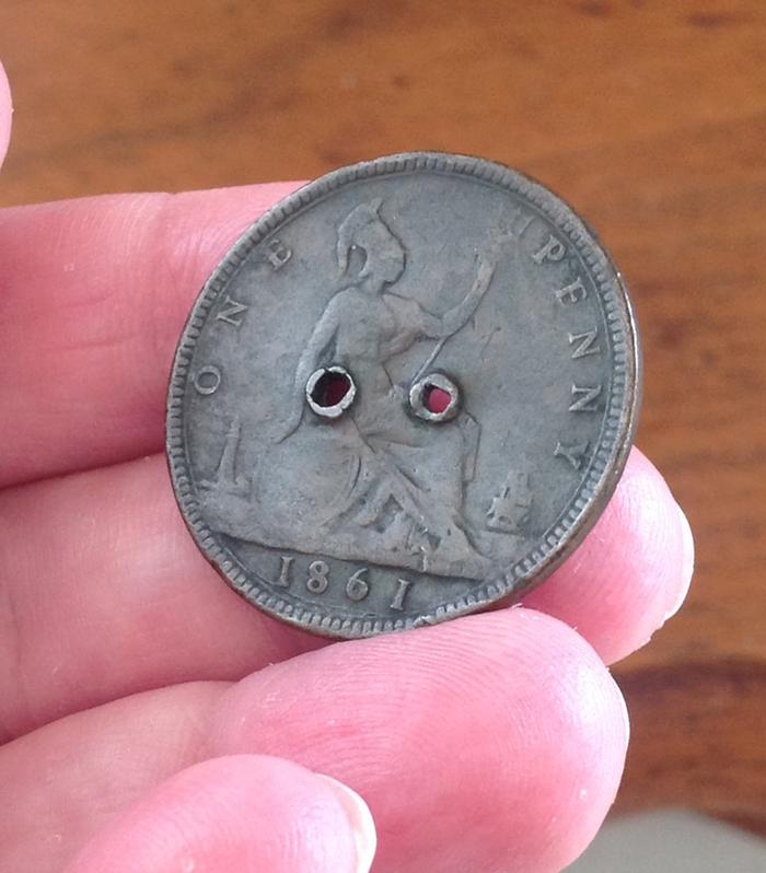 old penny metal button