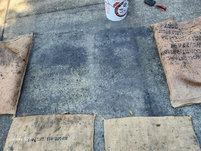 jute bags used in crushing biochar only leaked a little bit of charcoal onto the driveway