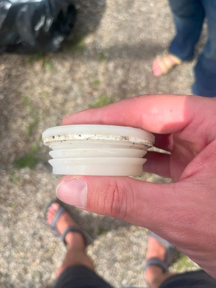 Cap that fits into hole with larger threads