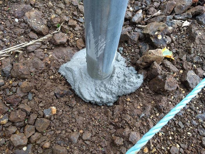 polytunnel anchor post secured with cement