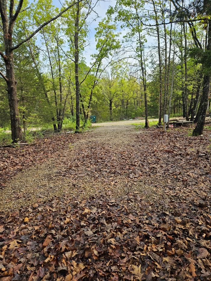 a gravel camper pad in the woods near Rolla, Missouri