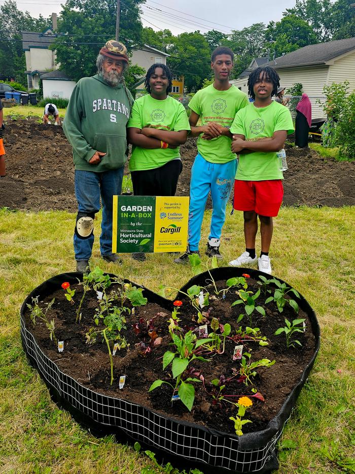 Planter beds on private lots in the shape of a heart for passerby snacks