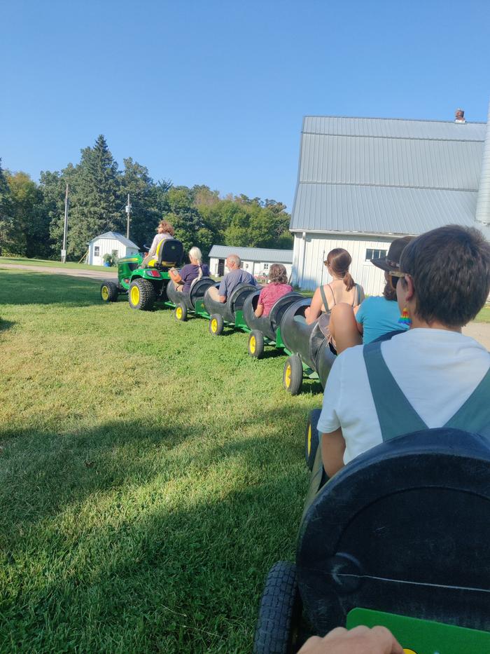 lawnmower train at a farm