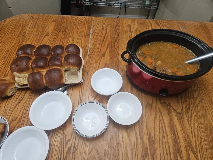 Chicken noodles soup and rolls