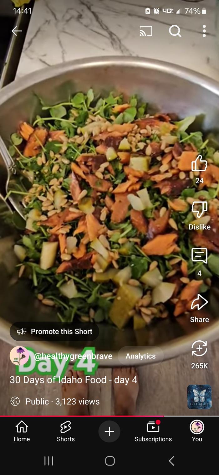 Trout salad over pea shoots