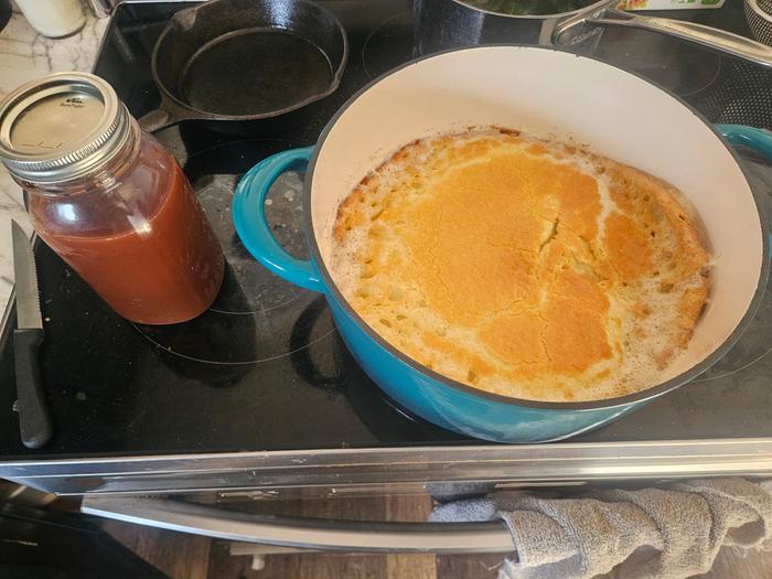 German pancakes served with cherry syrup