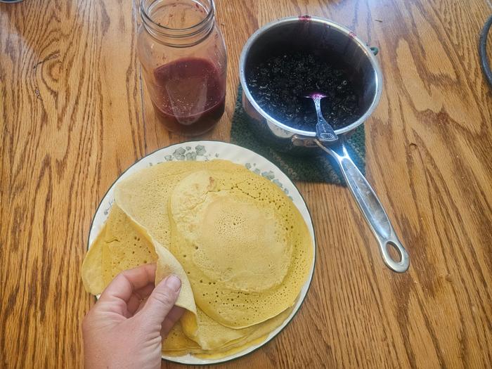 Crepes and cherry syrup
