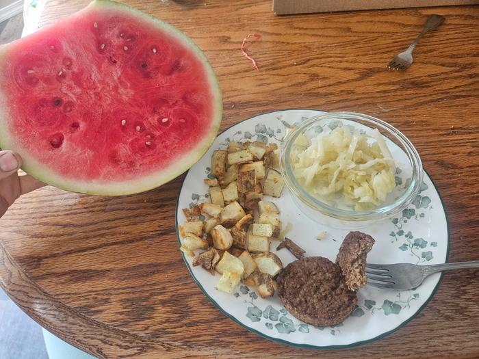 Deer sausage, sauerkraut, hashbrowns, melon